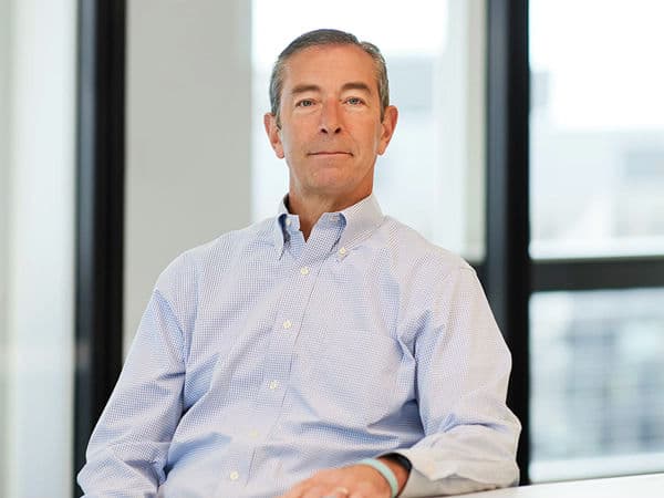 John R. Carroll, Managing Director