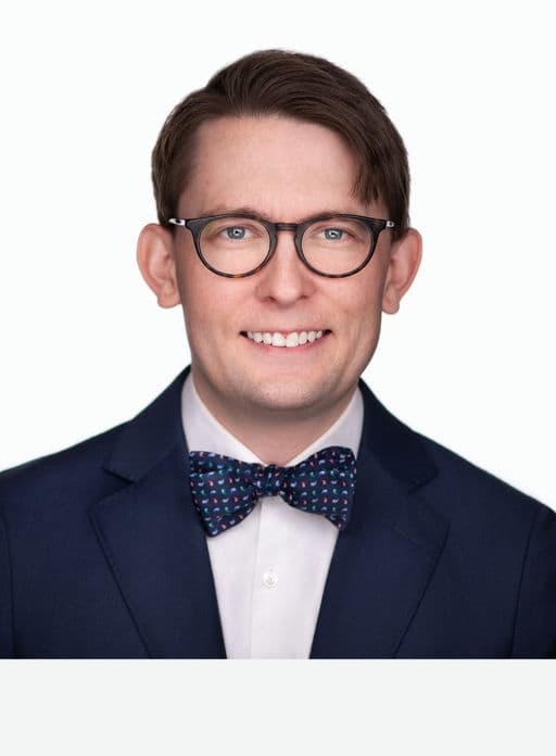 Travis Hughes, Principal
